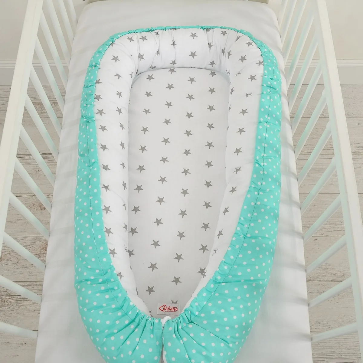 Dvipusis kūdikių kokonas „Premium Cocoon“ naujagimiams „BOBONO“, žvaigždutės, spalvos: rožinė ir žalia