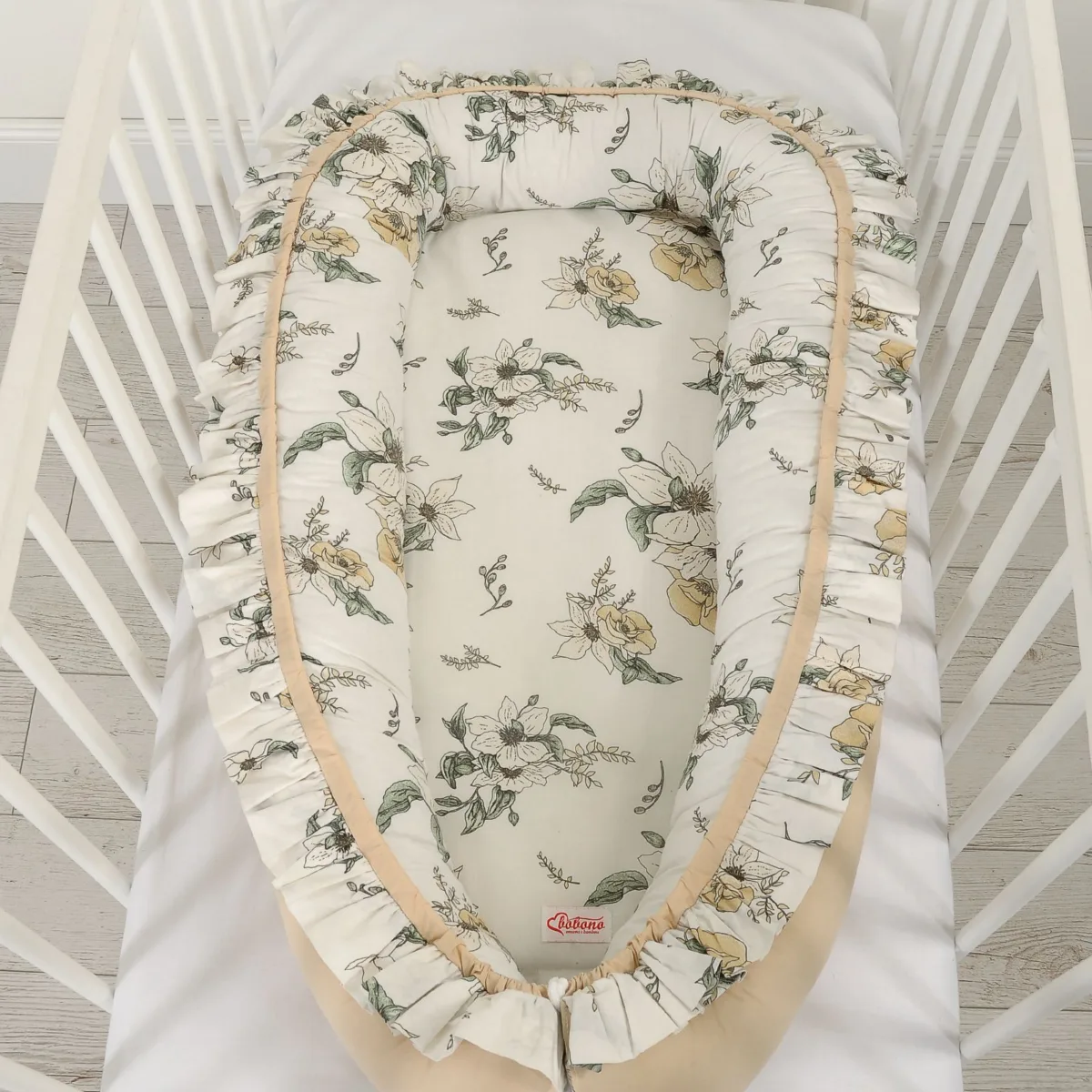 Kūdikių kokonas „Premium Cocoon“ naujagimiams su volanu