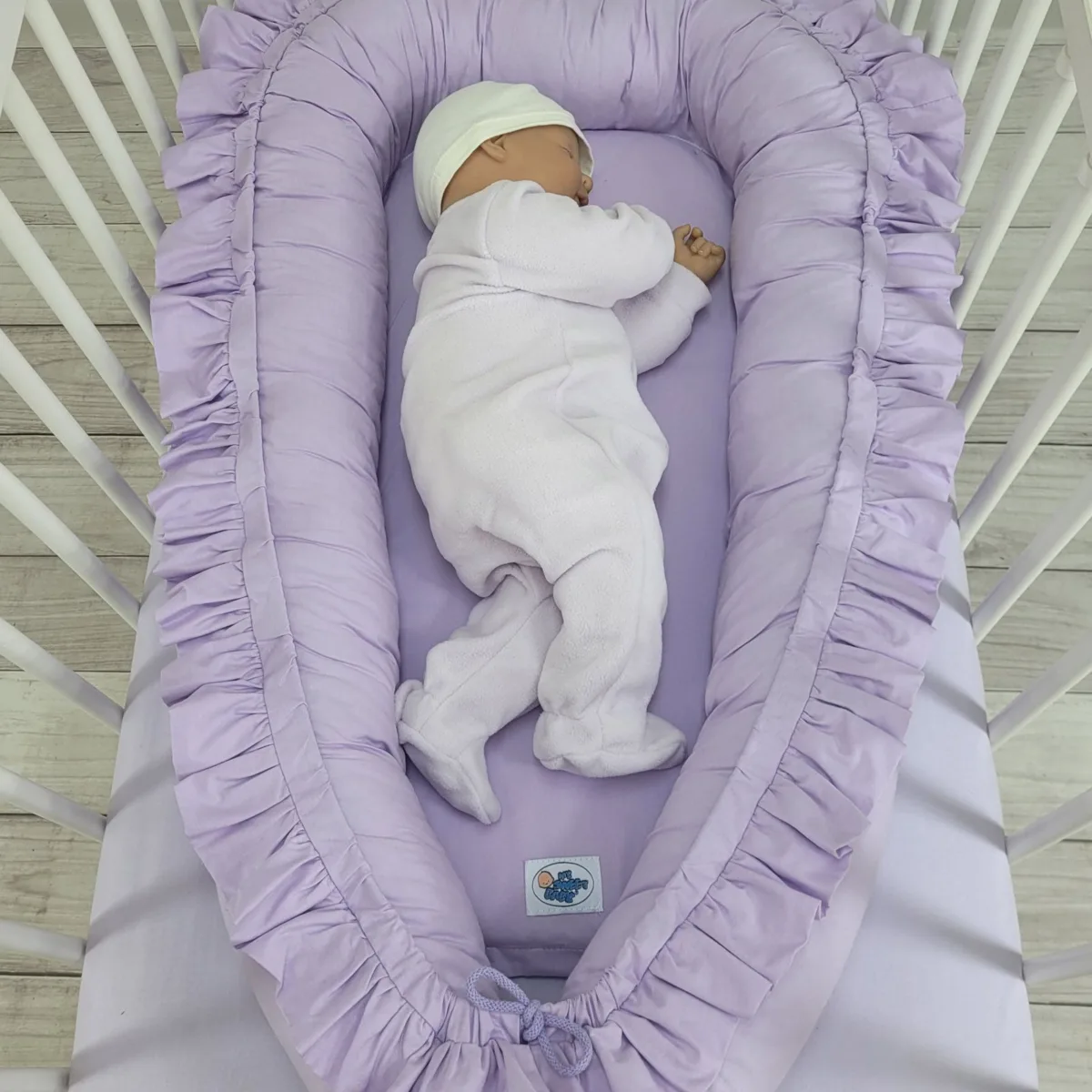 Kūdikių kokonas „Premium Cocoon“ naujagimiams su volanu „MY SWEET BABY“, spalvos: violetinė ir žalia