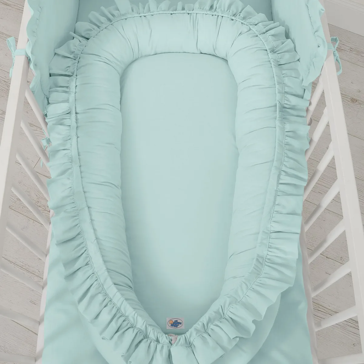 Kūdikių kokonas „Premium Cocoon“ naujagimiams su volanu „MY SWEET BABY“, spalvos: violetinė ir žalia