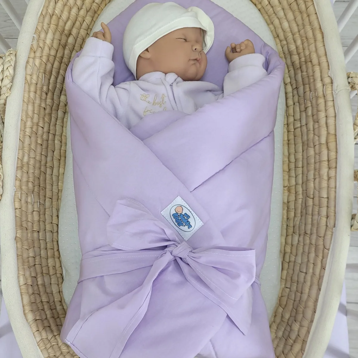 Dvipusis kūdikių lizdelis su kaspinu, spalvos: rožinė, violetinė ir žalia